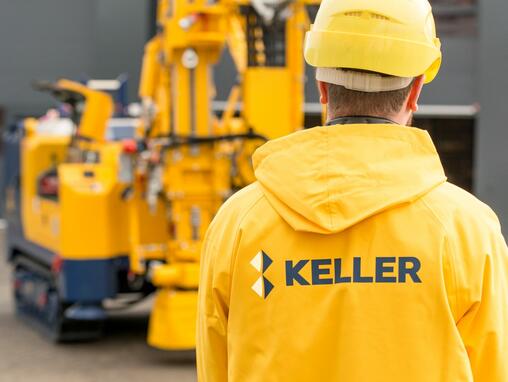 Employee in yellow Keller branded jacket